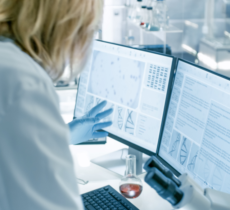 Researcher Image: A researcher using advanced technology in a lab to develop innovative treatments for multiple myeloma patients.